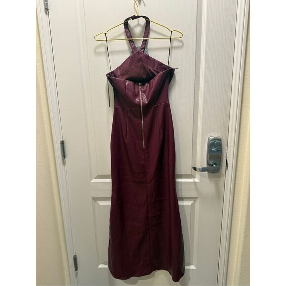 Eva Franco green floral garden party dress. Fitted top, flowy skirt.